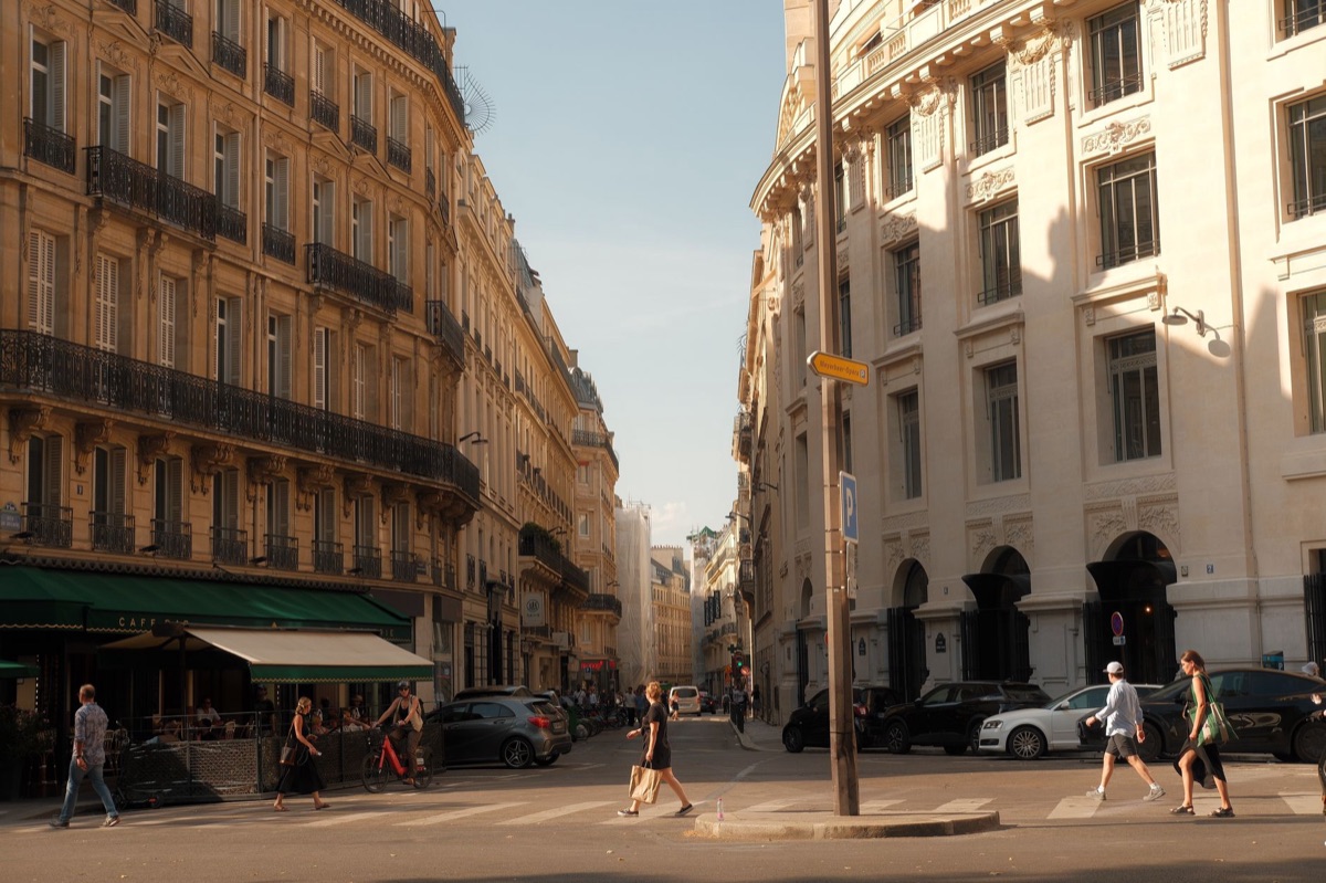 Modern Parisian street with diverse ethnic groups