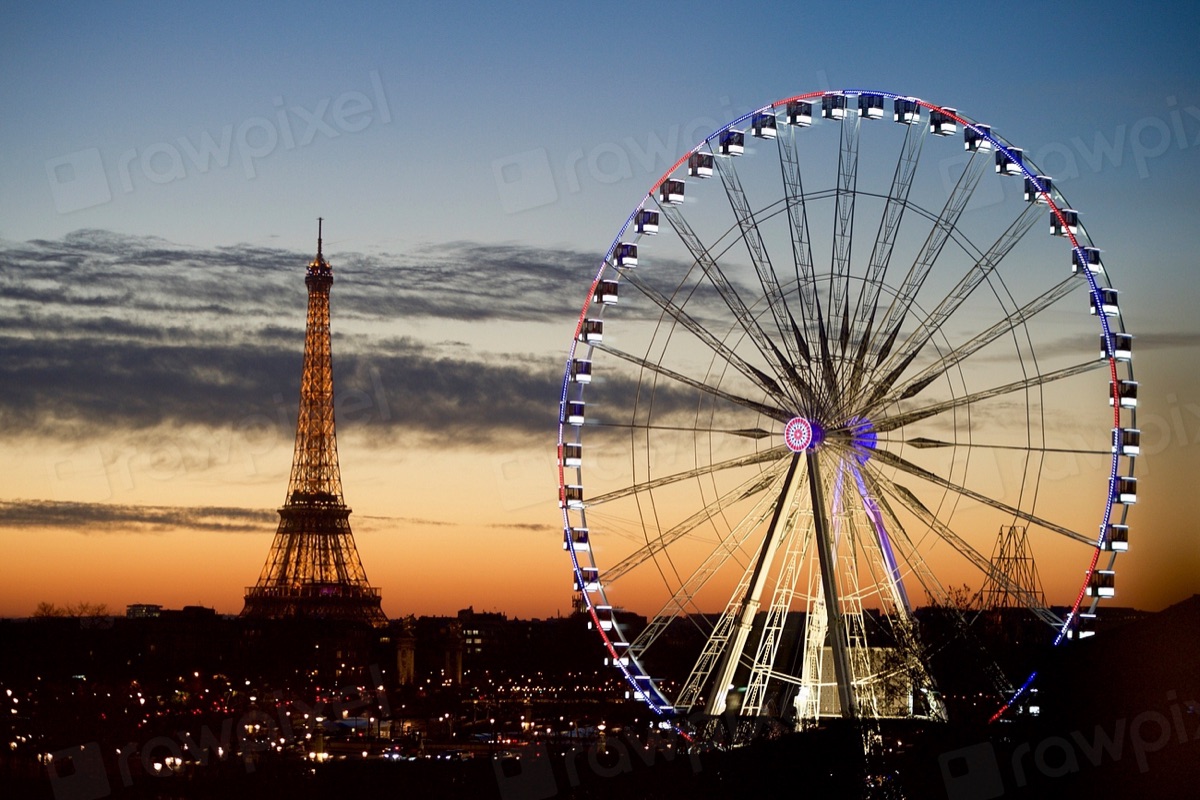Eiffel Tower at sunset with city background and Paris skyline